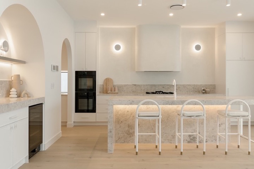 HAVEN. Sold. ⠀⠀⠀⠀⠀⠀⠀⠀⠀ Welcome to HAVEN, where elegance meets functionality in every corner, especially in our stunning kitchen. Bathed in white with luxurious marble accents and graceful arched details, this kitchen is the epitome of timeless beauty and contemporary convenience. ⠀⠀⠀⠀⠀⠀⠀⠀⠀ With a convenient wet bar…