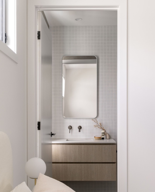 SPECTRE A bathroom designed to make a statement—deep moody tones, matte black finishes, and an atmosphere of effortless sophistication. Luxury in every detail. DESIGN · DEVELOP · CONSTRUCT