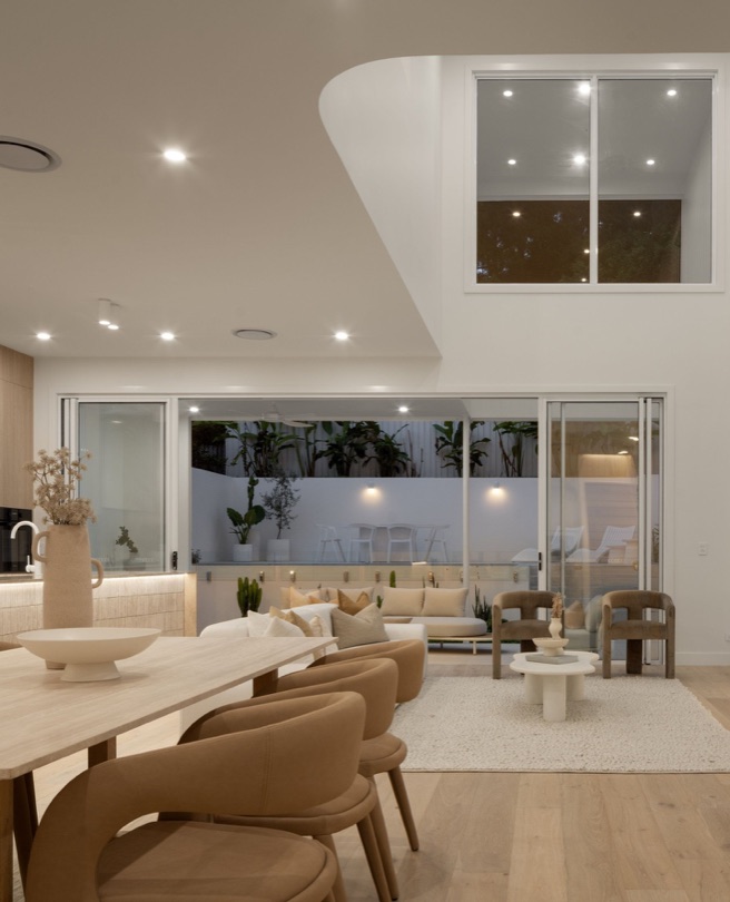 AURA Captured under the night sky, AURA reveals the depth of its design. Every line, material, and detail is elevated through considered lighting, showcasing a refined expression of luxury living. DESIGN · DEVELOP · CONSTRUCT