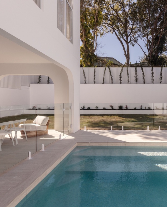 HERMOSA A light-filled sanctuary where calm meets considered design. White tapware, travertine stone, and sun-washed textures create a serene, refined palette. Step outside to an effortlessly designed outdoor haven — perfect for slow mornings, golden afternoons, and tranquil poolside moments. DESIGN · DEVELOP ·…