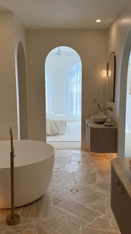 MILOS Arched windows, travertine stone, and crazy pave floors — this master suite is a slice of modern Mediterranean heaven in Camp Hill. Enquire at sales