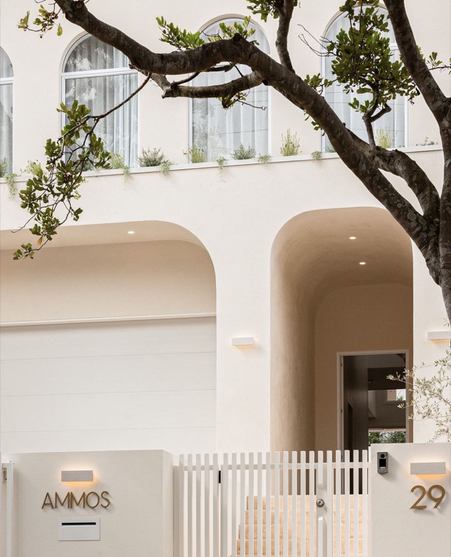AMMOS Now sold in Taringa, this modern Mediterranean residence pairs sculptural elegance with natural travertine stone—a true statement piece at the heart of the home. A timeless design that embodies elevated living. DESIGN · DEVELOP · CONSTRUCT