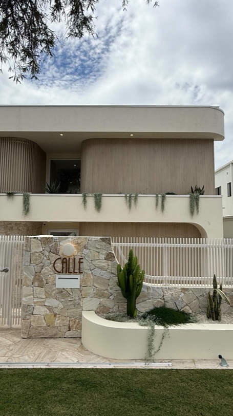 CALLE CALLE is complete — and now proudly handed over to its new owners. From the very beginning, this home was about materiality, texture, and timeless warmth. Natural stone anchors the spaces, while vein-cut travertine crazy pave creates movement and character underfoot. Rich dark timber cabinetry adds depth and…